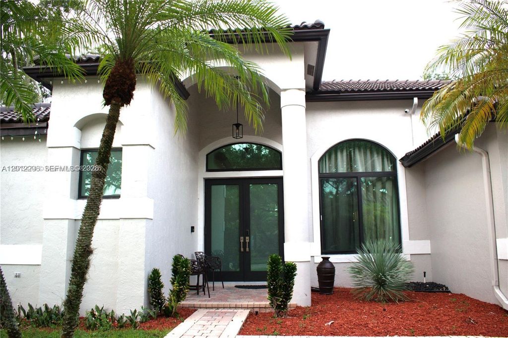 Photo of 1489 Lantana Ct, Weston, FL 33326 (MLS # A12012206)
