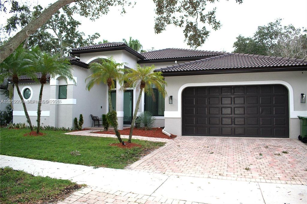 Photo of 1489 Lantana Ct, Weston, FL 33326 (MLS # A12012206)