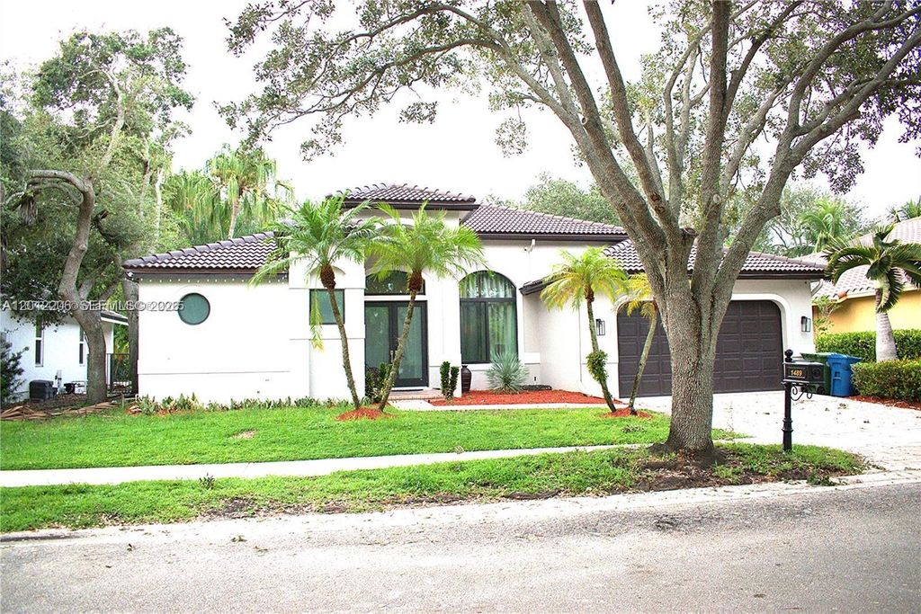 Photo of 1489 Lantana Ct, Weston, FL 33326 (MLS # A12012206)