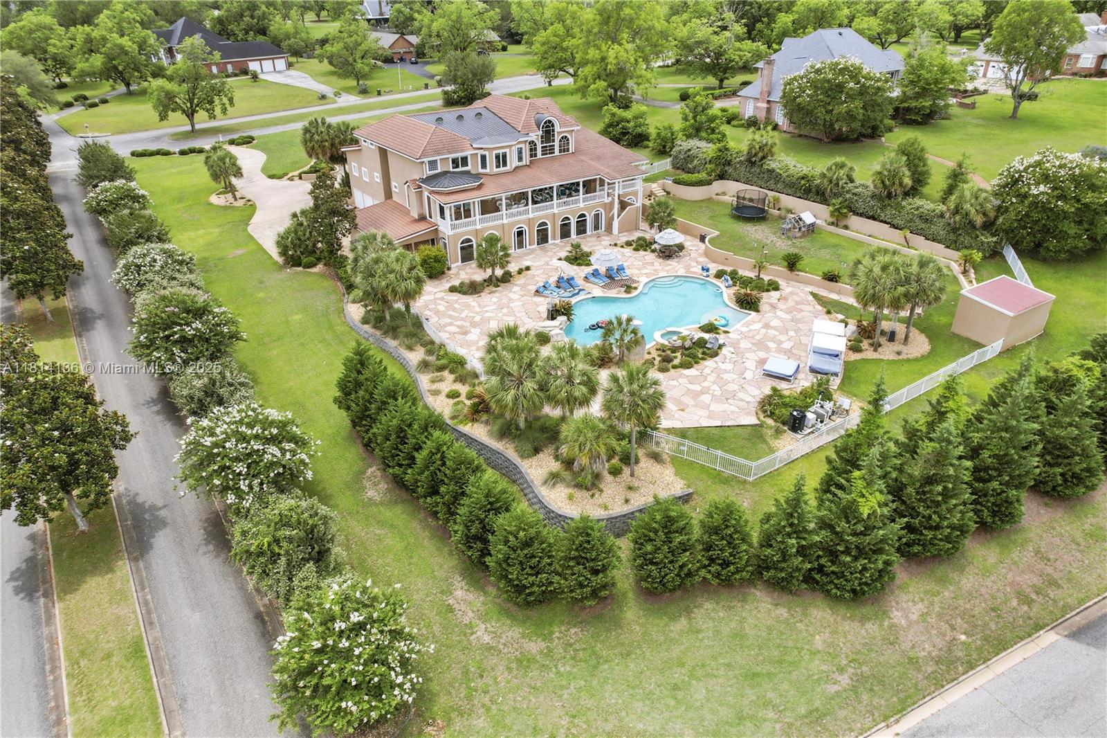 The seller is offering $7,000 in concessions, and the preferred lender is offering a 0.5%–1% lender credit—a rare opportunity! Luxury living in the prestigious Bocage community! This exquisite 8-bedroom, 5-bath estate spans over 11,500 sqft on more than an acre, just 4 minutes from the Robert Trent Jones Golf Course and 1.5 hours from the beach. Inside, you'll find marble flooring throughout, a custom marble fireplace, and a chef’s kitchen with double ovens, two stovetops, a Sub-Zero fridge, and a double pizza oven. The main-level owner’s suite features a jetted tub and spa-style bath. The in-law suite includes its own full kitchen and private theater.
Enjoy two theater rooms, a game room, Florida room, gym, sauna, gorgeous pool, and a breathtaking 500-gallon saltwater aquarium.