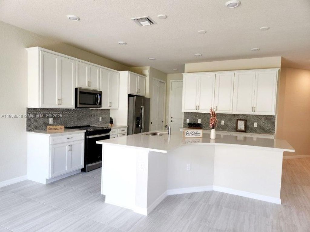 Photo of 8189 Cinch Way #8189, Lake Worth, FL 33467 (MLS # A11908540)