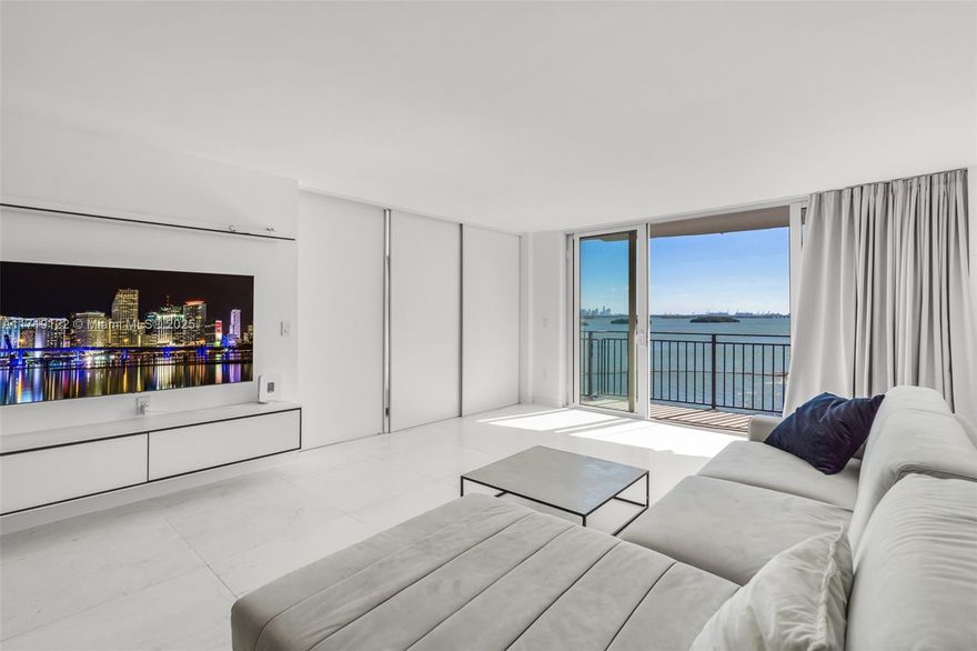 Fully renovated 1-bedroom, 2-bathroom + den condo with 1,042 square feet of bright, modern living space. Every detail has been updated, from the sleek kitchen featuring high-end appliances and custom cabinetry to the contemporary bathrooms with luxurious fixtures. New lighting, flooring, and finishes create a seamless, sophisticated design throughout. Enjoy stunning Biscayne Bay and skyline views from your private balcony in this waterfront community. The spacious primary suite includes ample closet space and an en-suite bath. Washer & dryer in unit. Amenities include a waterfront pool, tennis & pickleball courts, fitness center, BBQ area, and 24/7 security. Ideally located near shopping, dining, and all that Miami has to offer.