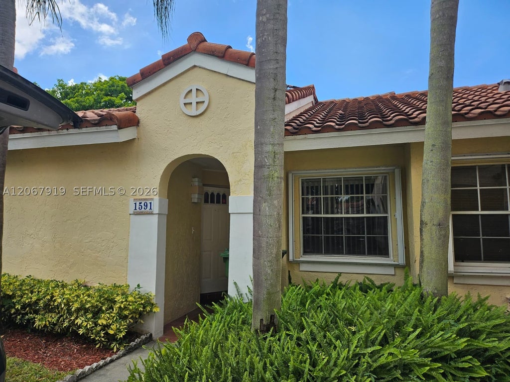 Photo of 1591 Springside Dr #1591, Weston, FL 33326 (MLS # A12067919)