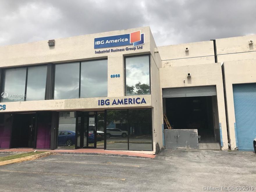 Warehouse by busy MIA Airport with offices or showroom, dock height and small ramp.  Price to sell !!!