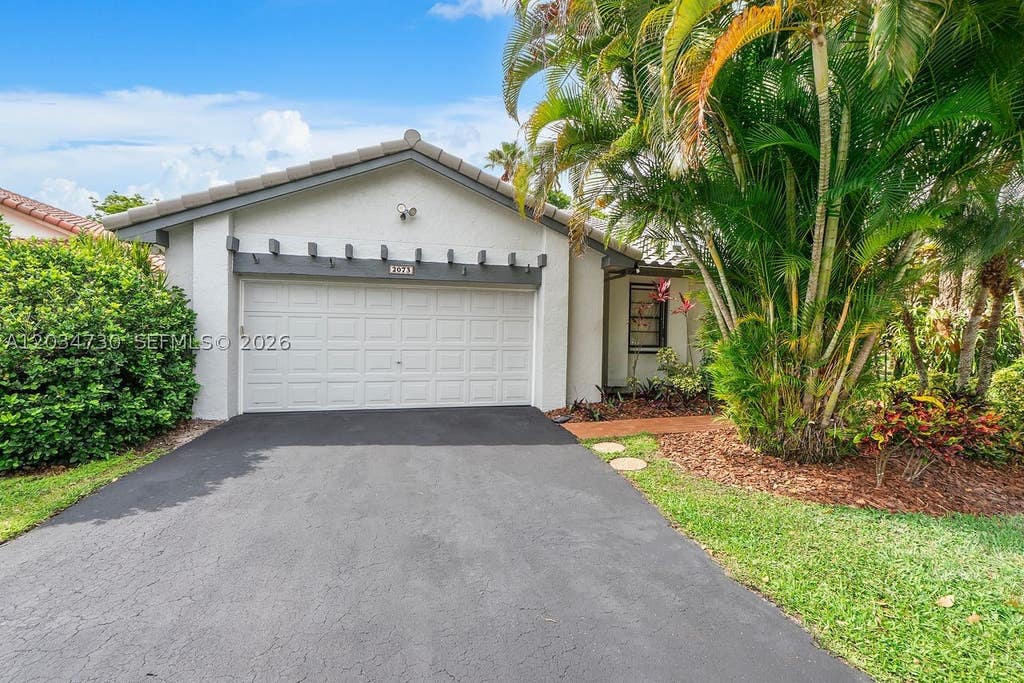 Photo of 2073 Montpeliar, Weston, FL 33326 (MLS # A12034730)