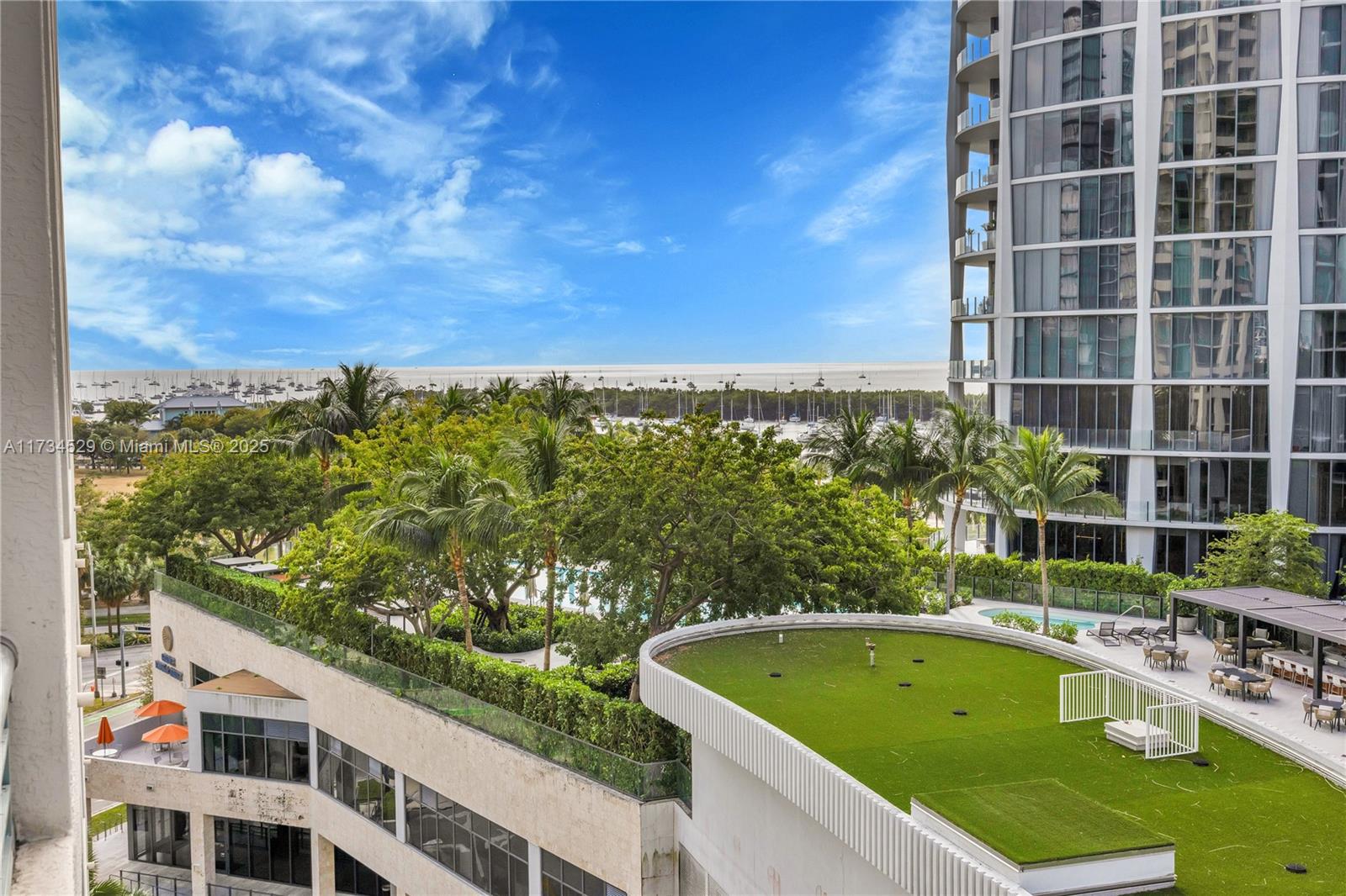 Masterfully updated from top to bottom, this spectacular 2 BR, 2.5 BA, 1,666 SF condo in Ritz Tower Residences is what every discerning buyer has been waiting for! No detail has been overlooked in renovating this spectacular unit w/ its gourmet kitchen featuring built-in wine cooler, stunning center island, & glass-front cabinets, open dining rm, living rm w/ custom feature wall, & spacious balcony perfect for al fresco dining that has views to Biscayne Bay. The ample primary BR also has balcony access, spa-like BA inc’l glass soaking tub & separate shower, & gorgeous walk-in closet. The additional BR suite is very spacious, & its renovated BA has gorgeous cabinetry, + tub & shower. Other features inc’l impact glass, in-unit laundry, 1 parking space, valet, high-end appliances, & more!