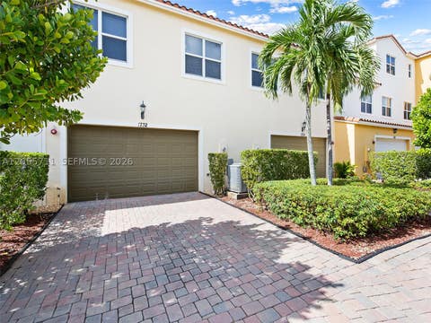 Photo of 1732 NW 124th Pl, Pembroke Pines, FL 33028 (MLS # A12055711)