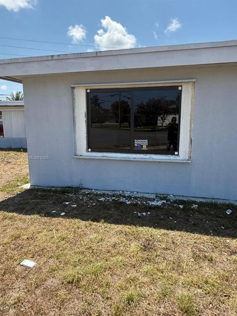Tiny photo for 1501 NW 3rd Way, Pompano Beach, FL 33060 (MLS # A12010267)