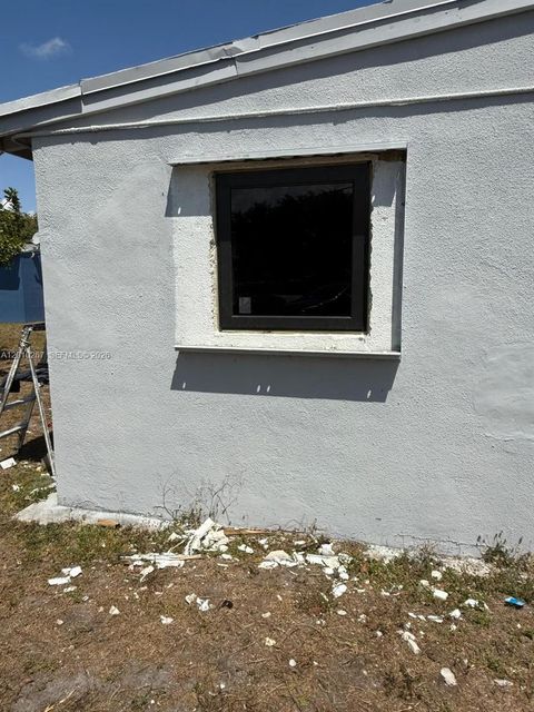 Tiny photo for 1501 NW 3rd Way, Pompano Beach, FL 33060 (MLS # A12010267)