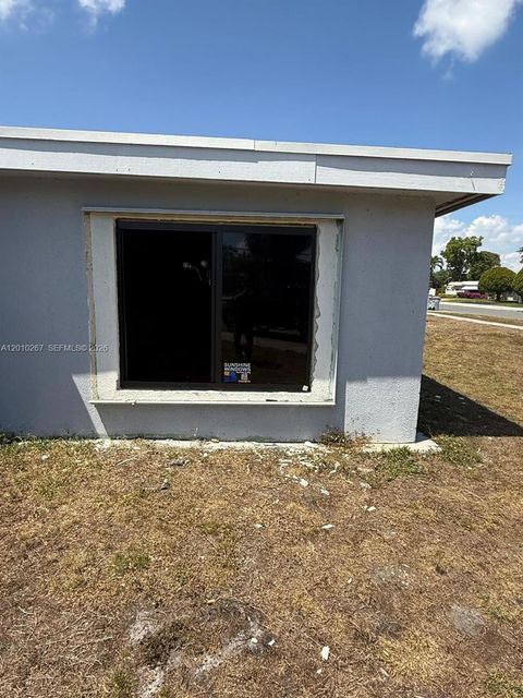 Tiny photo for 1501 NW 3rd Way, Pompano Beach, FL 33060 (MLS # A12010267)