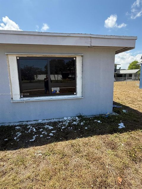 Tiny photo for 1501 NW 3rd Way, Pompano Beach, FL 33060 (MLS # A12010267)