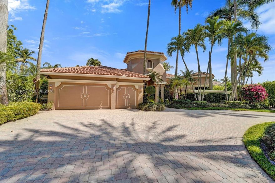Nestled within the prestigious gaurd-gated community of Hawks Landing, this exceptional one story ranch style estate offers elegance, comfort, and true South Florida Living. Set on an oversized 15,000+ sq.ft. lakefront lot, the home spans approx. 3800 sq.ft interior with a split floor plan featuring 4BD, 4.5BA and a private office. The layout is thoughtfully designed with the primary suite privately situated on one side, two bedrooms on the opposite wing, and a separate bedroom and bath ideal for guests, in-laws, or nanny quarters, offering both privacy and flexibility. A large driveway and three-car garage enhance the home's strong curb appeal. Inside, marble floors flow through the main living areas, with carpeted bedrooms and a timeless Mediterranean design curated by Steven G. Designed for seamless indoor-outdoor living, the backyard showcases tranquil lake views, a resort-style pool and spa, elegant fountains, and a fully equipped summer kitchen, ideal for entertaining or relaxing in privacy. Recent upgrades include a 2018 roof and two newer AC units. Hawks Landing offers a renovated clubhouse, fitness center, tennis, pickleball, basketball, playgrounds, and 24 hour security, all just minutes from major highways, Ft.Lauderdale, top schools, dining, and shopping.