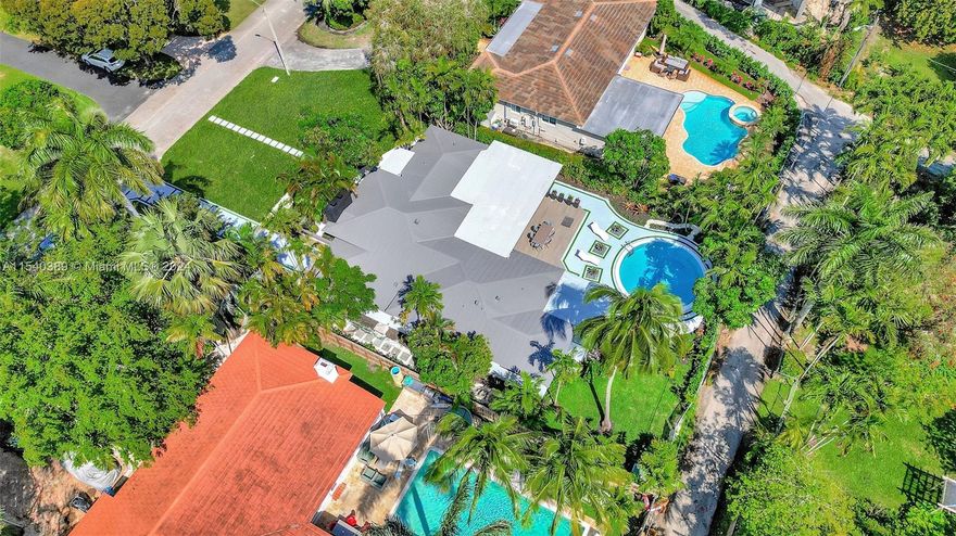 Welcome to your dream home! Fully renovated, LIVING AREA IS 2,461 sqft, This gem has undergone a total makeover, boasting brand-new plumbing, ducts, AC, and electrical work. Step into luxury with high-end appliances that make cooking a breeze in our open-concept kitchen. Retreat to the oversized master suite, complete with a sprawling walk-in closet and a spa-like bathroom that's big enough to dance in. Enjoy lazy afternoons lounging by the water or entertain guests in style. Don't miss out on this chance to call this beauty yours!