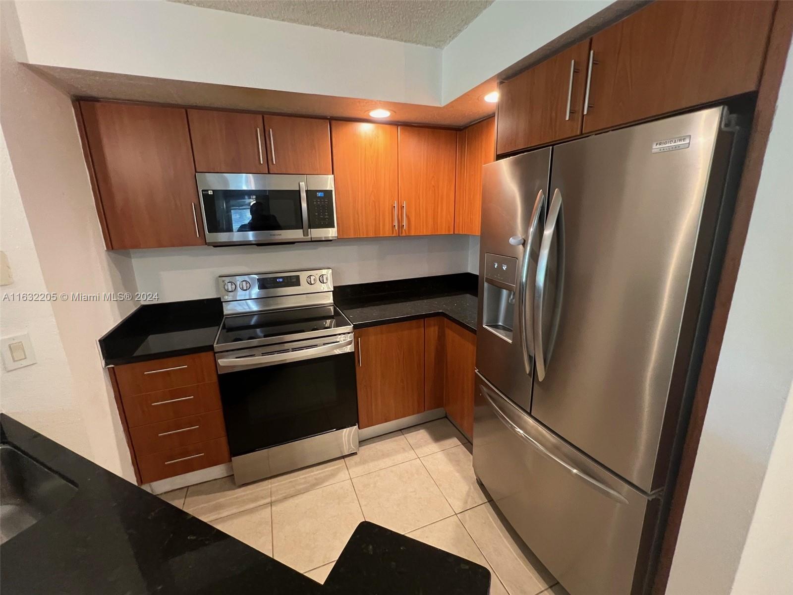 RECENTLY REMODELED CONDO 2BR 2BA in CORAL KEY, The largest floor plan. First floor corner unit. VERY BRIGHT AND SPACIOUS, All impact windows, SS appliances, granite countertops, rainfall shower in master, Ceramic floor, Washer and dryer in unit, Storage, Resort style community with Club house, swimming pool, jacuzzi, gym & tennis court. HOA requires minimum credit of 620. Quick approval. NO PETS. Equal Housing Opportunity.