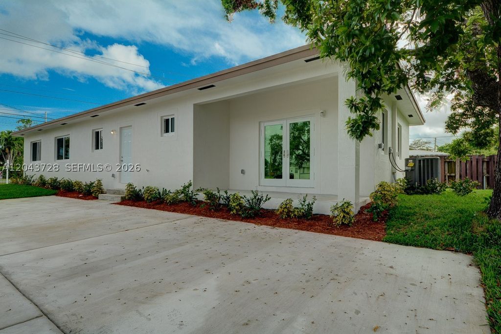 Photo of 312 Phippen Waiters Rd, Dania Beach, FL 33004 (MLS # A12043728)