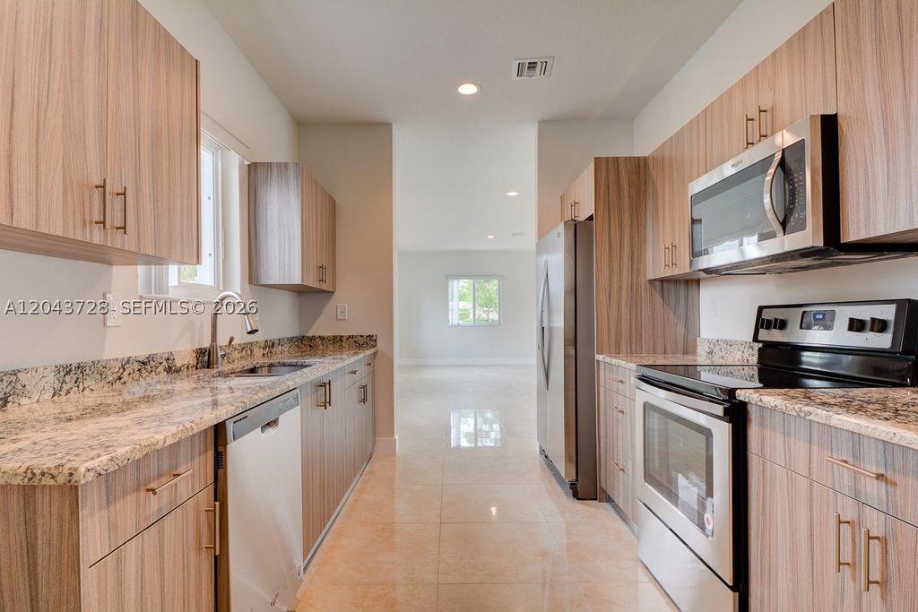 Photo of 312 Phippen Waiters Rd, Dania Beach, FL 33004 (MLS # A12043728)
