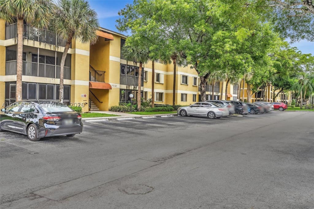 Photo of 3021 N Oakland Forest Dr #208, Oakland Park, FL 33309 (MLS # A12056999)