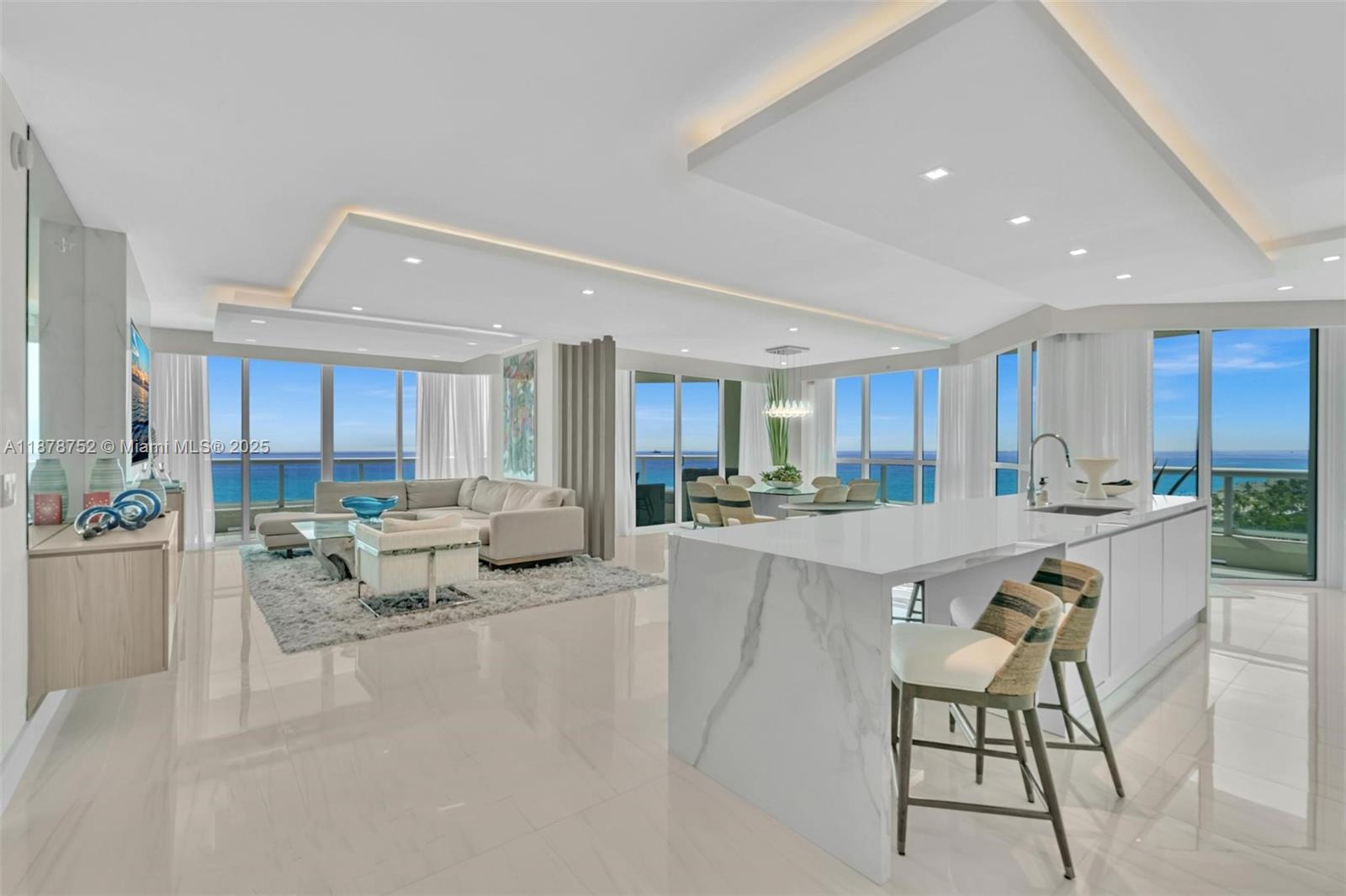 Live above the sand in Residence 1201 at Las Olas Beach Club — where every room frames the ocean. This private-elevator corner home spans nearly 3,000 sq ft with 4 bedrooms and 4 baths, each offering floor-to-ceiling glass and beachfront views. A chef’s kitchen with Wolf, Sub-Zero & Bosch appliances and a striking glass wine wall anchor the modern open layout. Step outside to a 1,000 sq ft wraparound terrace that floats over the shoreline, creating an indoor-outdoor experience unlike anything else on Fort Lauderdale Beach. Resort amenities complete this turnkey coastal masterpiece. EASY TO SHOW!