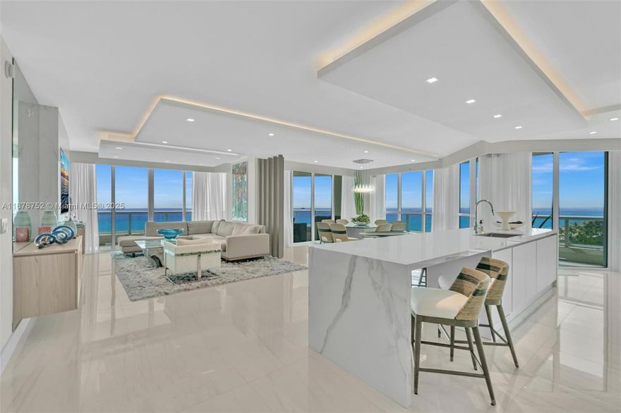 Live above the sand in Residence 1201 at Las Olas Beach Club — where every room frames the ocean. This private-elevator corner home spans nearly 3,000 sq ft with 4 bedrooms and 4 baths, each offering floor-to-ceiling glass and beachfront views. A chef’s kitchen with Wolf, Sub-Zero & Bosch appliances and a striking glass wine wall anchor the modern open layout. Step outside to a 1,000 sq ft wraparound terrace that floats over the shoreline, creating an indoor-outdoor experience unlike anything else on Fort Lauderdale Beach. Resort amenities complete this turnkey coastal masterpiece. EASY TO SHOW!