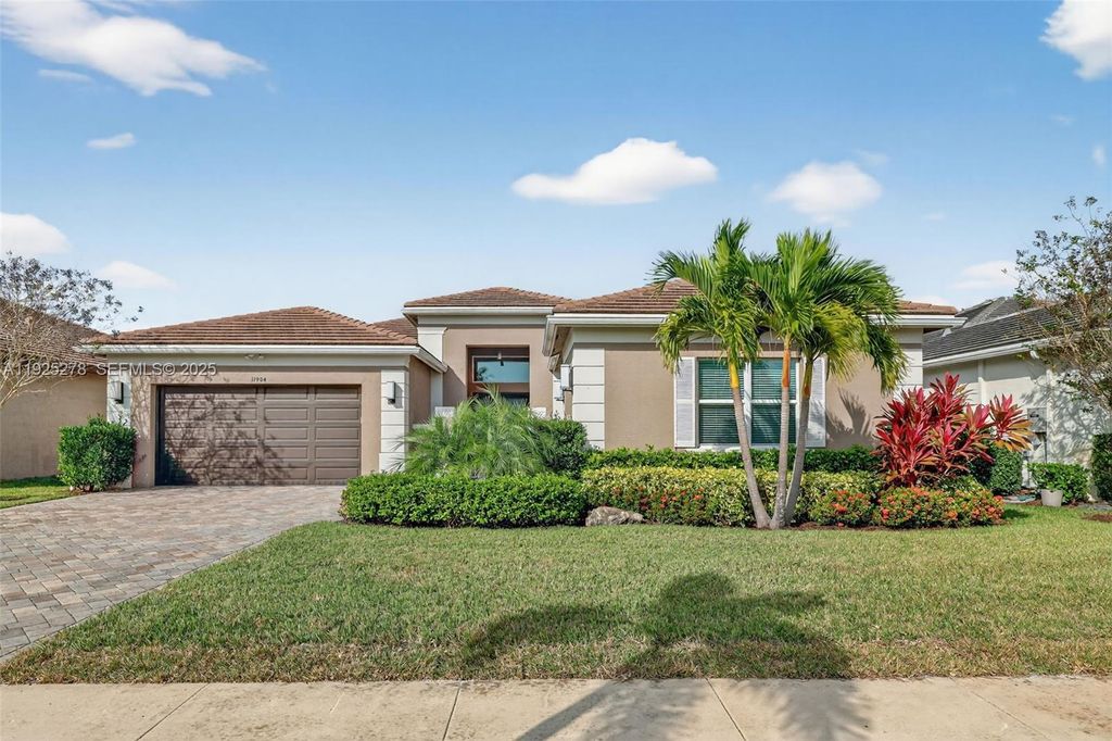 Photo of 11904 SW Sailfish Isles Way, Port St Lucie, FL 34987 (MLS # A11925278)