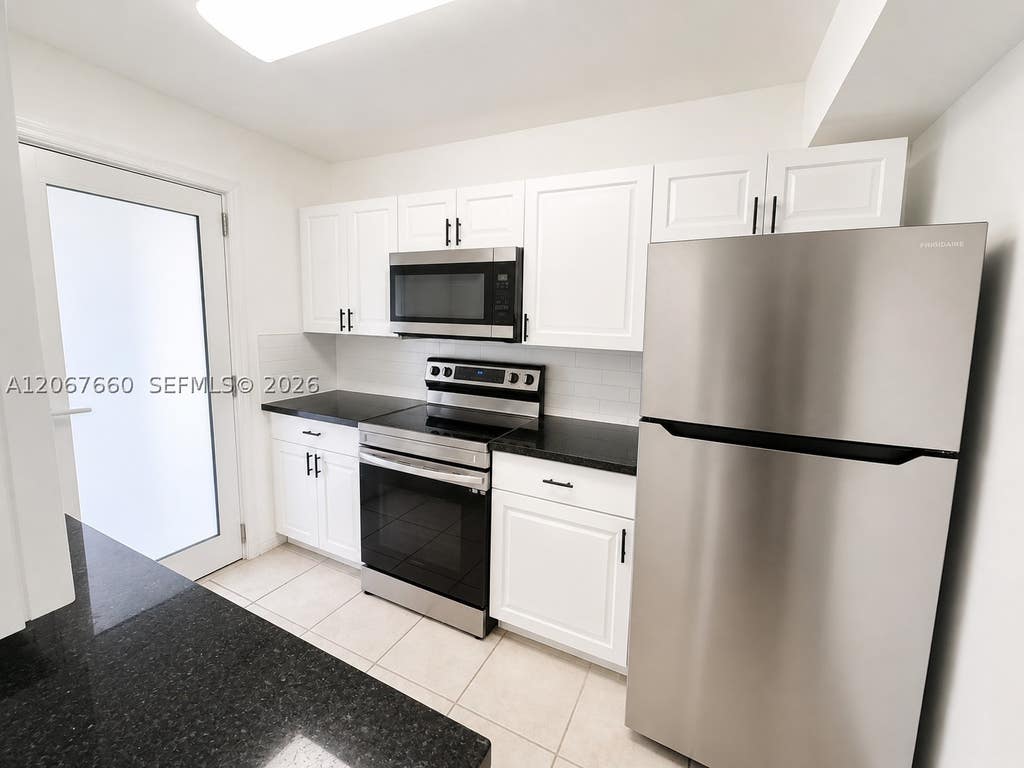 Photo of 500 E Country Club Cir #4, Plantation, FL 33317 (MLS # A12067660)