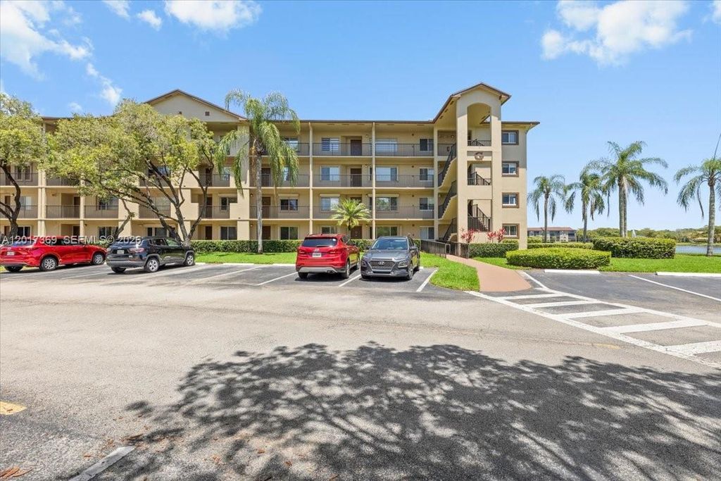 Photo of 1351 SW 141st Ave #213G, Pembroke Pines, FL 33027 (MLS # A12017369)
