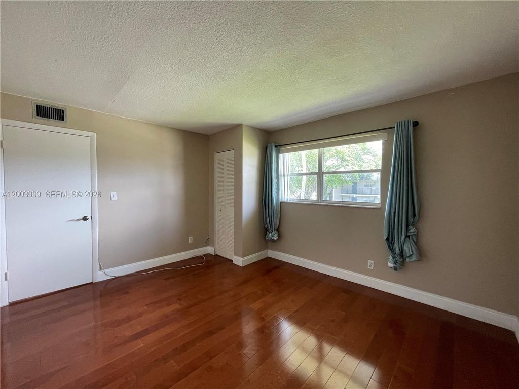 Photo of 7900 S Colony Cir S #204, Tamarac, FL 33321 (MLS # A12003099)