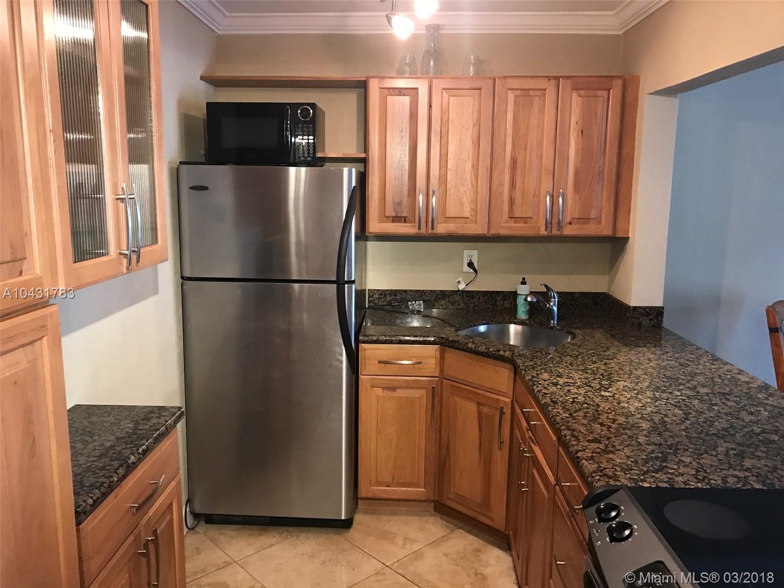 THIS IS A GREAT, BEAUTIFUL, WELL KEPT AND TASTEFULLY REMODELED CONDO WITH MARBLE FLOORS, GRANITE COUNTER TOP ON A OPEN CONCEPT KITCHEN WITH CHERRY WOOD CABINETS, REMODELED BATHROOM AND CENTRAL A/C ALSO APLENTY OF CLOSET SPACE, ALL OF THIS IN A VERY BRIGHT CONDO OVERLOOKING THE POOL FROM YOUR VERY SPACIOUS PRIVATE BALCONY.

(ALSO AVAILABLE WITH FURNITURE AT $1450.00)