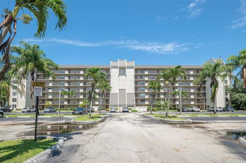 Photo of 3150 W Rolling Hills Cir #307, Davie, FL 33328 (MLS # A11828700)