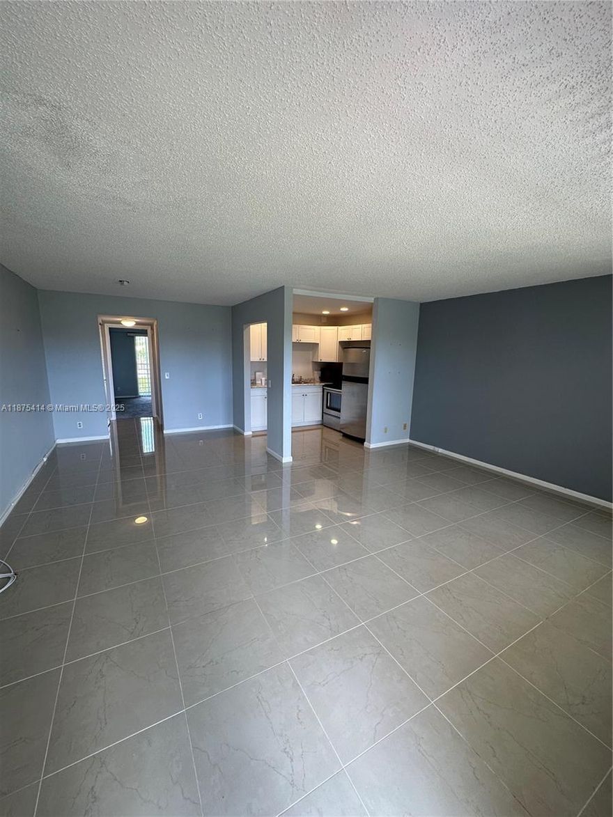 Very Attractive Condo 55+. Brighton Community, 1 bedroom, 1 1/2 bath unit. Very close to community Entrance and House of Worship. Tile flooring in Living room. Dining room, kitchen and bathrooms, plush carpet in Bedroom.Modern kitchen with Stainless Steel Appliances. Laundry facilities on same floor. Enclosed balcony were you can relax. Century Village offers a spacious and elaborate clubhouse with numerous amenities such as Theatre, cardrooms, fitness center, library, pools, tennis, etc. Extensive bus service is also available for shopping and dining.Cable and Internet Included!! unfurnished.