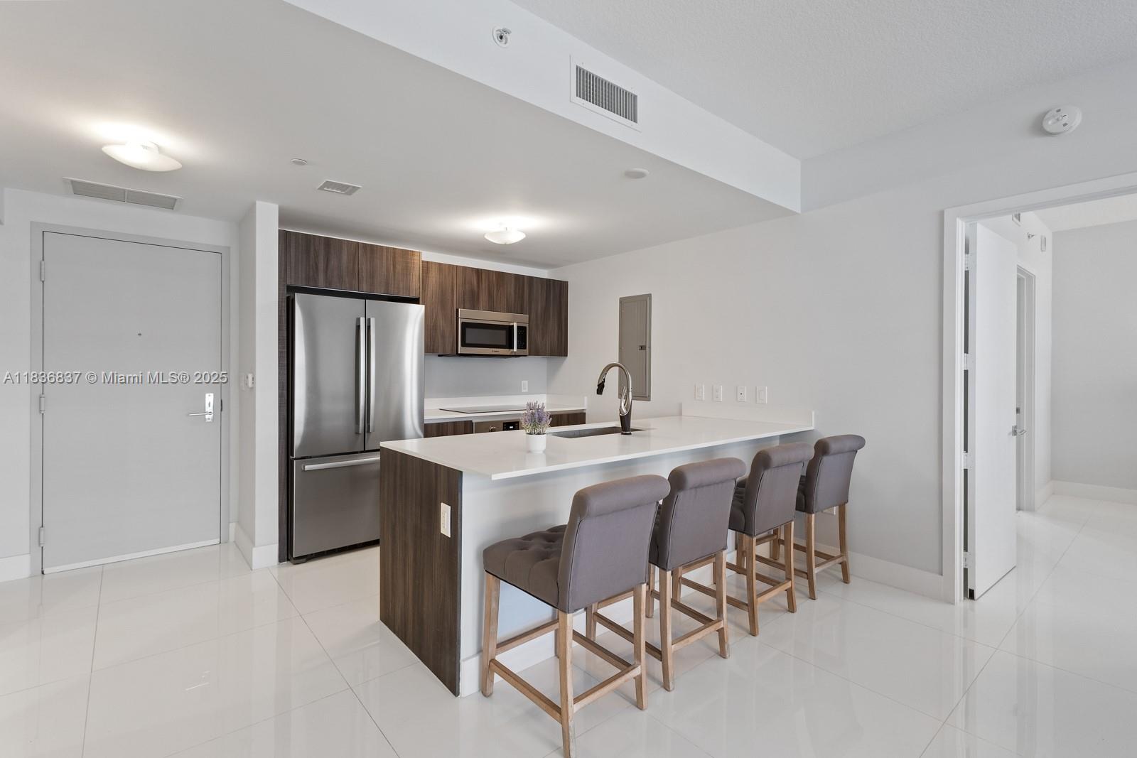 Welcome to your luxury and vibrant home at Aria on the Bay, in Miami’s prime Edgewater. This 2-bed, 2.5-bath en-suite condo was recently painted and features an oversized balcony with water views from every room. Includes Italian cabinets, elegant floors, two walk-in closets, bidet toilets, and same-floor parking. Amenities: two pools, panoramic jacuzzi, gym, yoga, spa, sauna, steam room, massage room, 24/7 security, multiple elevators, BBQ grills, business center, theater, pool tables, game and kids' rooms, sauna, concierge, valet. Steps from Margaret Pace Park with courts, BBQs, and playground. Walk to restaurants, Publix, Starbucks, UPS, marina, banks, and more. Quick access to beaches, airport, hospitals, Brickell, and downtown. Don’t miss this opportunity to own in the heart of Miami.
