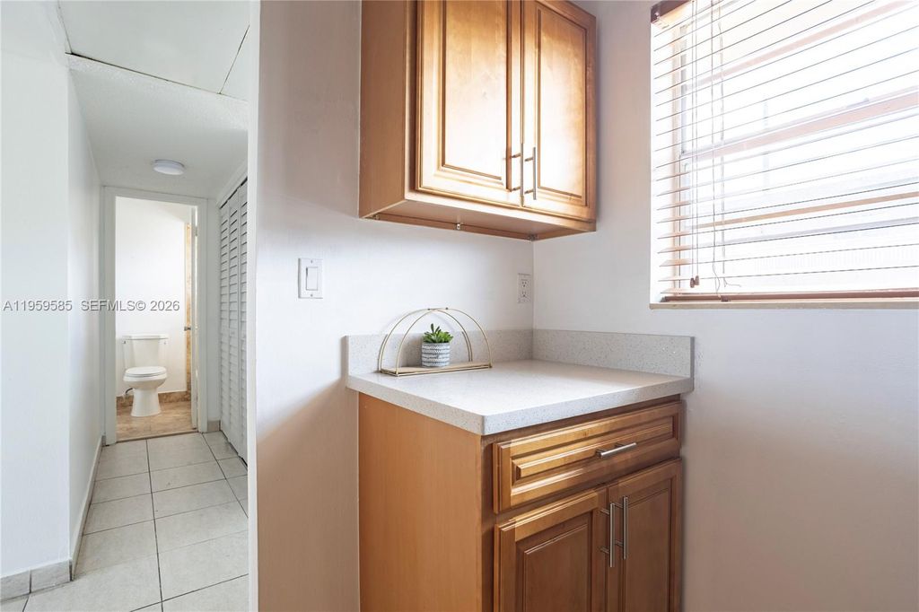 Photo of 5021 W Oakland Park Blvd #204, Lauderdale Lakes, FL 33313 (MLS # A11959585)