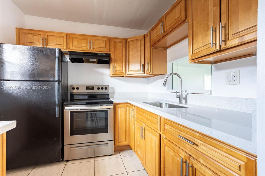 Photo of 5021 W Oakland Park Blvd #204, Lauderdale Lakes, FL 33313 (MLS # A11959585)