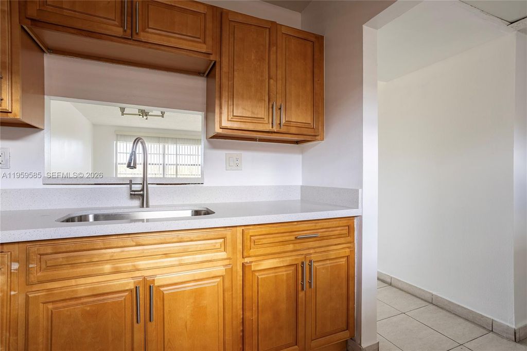 Photo of 5021 W Oakland Park Blvd #204, Lauderdale Lakes, FL 33313 (MLS # A11959585)