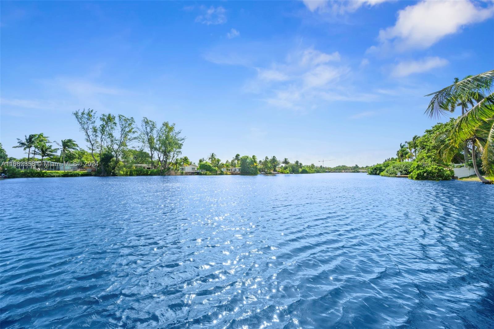 BRING YOUR VISION TO LIFE WITH THIS UNIQUE CORNER WATERFRONT HOME. A PATH LEADS FROM THE POOL TO THE WATER FEATURING A LARGE, PRIVATE DOCK PERFECT FOR RECREATIONAL ACTIVITIES & ENJOYING EARLY MORNING SUNRISES & EVENING SUNSETS. A VERY FUNCTIONAL FLOOR PLAN OPENS TO THE OUTDOORS FOR ENTERTAINING LARGE PARTIES. A FEW OF THE EXTRA FEATURES INCLUDE: TWO OVERSIZED PRINCIPAL BEDROOMS, A FORMAL DINING, & AN ADDITIONAL SPACE OFF THE SPACIOUS KITCHEN THAT SERVES MANY PURPOSES. VAULTED CEILINGS ADD THE ALLUE OF THIS WF HOME. WITH TLC, TURN THIS DIAMOND INTO YOUR DREAM HOME. PERFECT FOR INVESTORS LOOKING TO CUSTOMIZE A WF GEM. (BOATER/BUYER/PURCHASER TO CONFIRM ACCESS TO OCEAN
ACCORDING TO MIAMI-DADE COUNTY TAX: ADJ. AREA ACCORDING TO OWNER IS 3293 SF 4112 SF INFO. NOT WARRANTED/GUARANTEED
