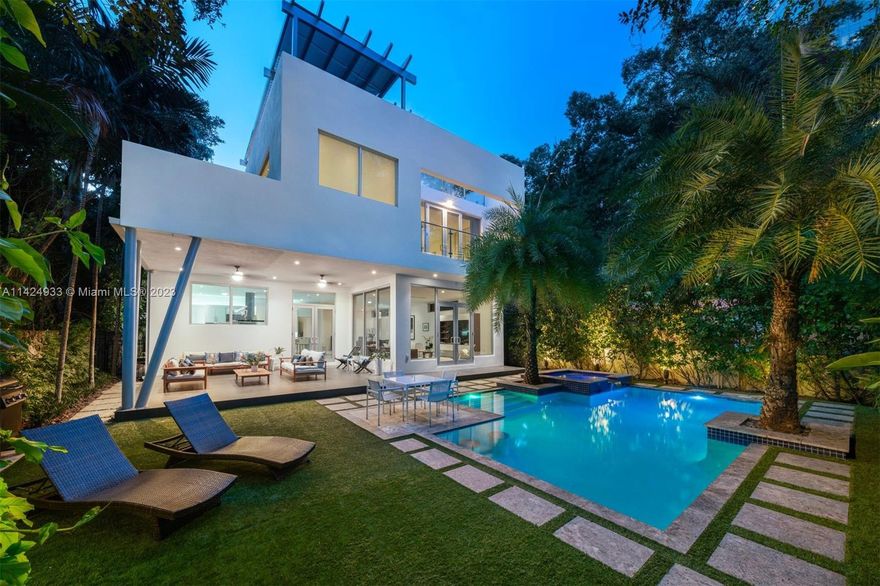 Fully customized two-story Contemporary residence, nestled on one of Miami’s historically significant streets – S. Miami Ave. Completely gated with foyer entry and floor-to-ceiling windows throughout. The generously designed open floor plan lends itself to effortless entertainment options with an expansive covered terrace overlooking the pool and spa area, and a private rooftop paradise with an outdoor kitchen, hot tub, and panoramic views. Spacious gourmet Kitchen with cooking island. The Primary Room offers a private balcony, walk-in closet, and resort-style bathroom. 2 car garage. Discover the lively atmosphere Brickell has to offer, with its wide range of restaurants and amenities just a short distance away.