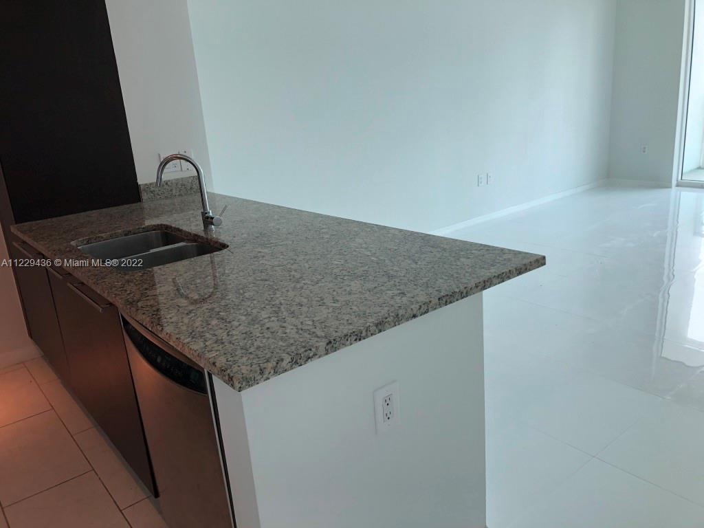 THE PLAZA 901 BRICKELL CO - Residential Lease