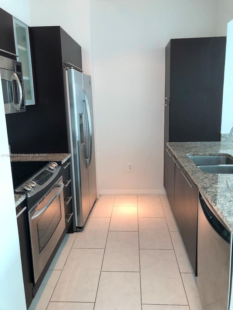 THE PLAZA 901 BRICKELL CO - Residential Lease