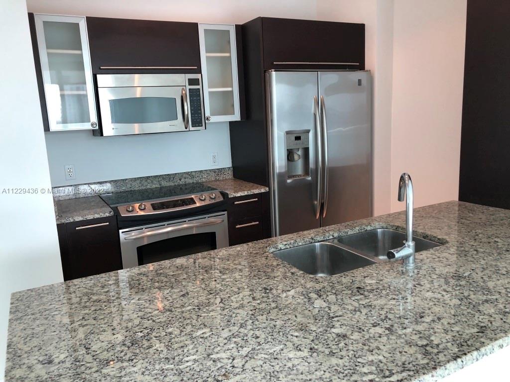 THE PLAZA 901 BRICKELL CO - Residential Lease