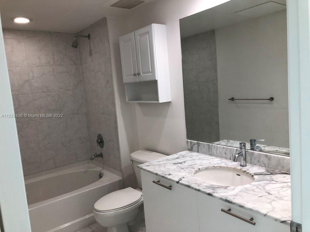 THE PLAZA 901 BRICKELL CO - Residential Lease