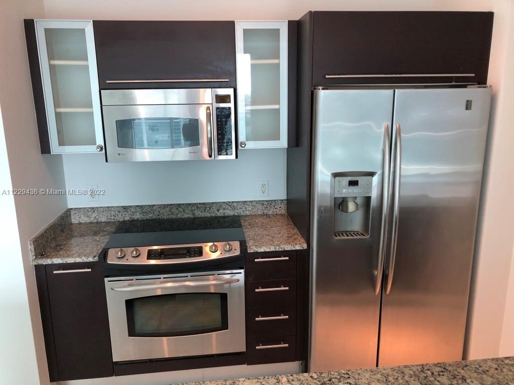 THE PLAZA 901 BRICKELL CO - Residential Lease