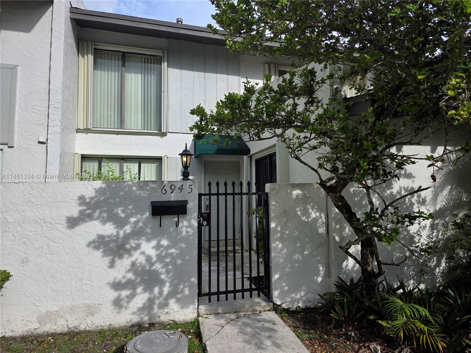 This exceptional property is situated in an ideal location, offering a variety of desirable features. The unit 3 bedrooms and 2 bathrooms (one bedroom with full bathroom on the first floor), boasts elegant tile floors, a gas stove, a microwave, washer and dryer conveniently located inside , lots of closets. Additionally, accordion shutters are installed throughout the property for added security. Residents will appreciate the two parking spaces and the picturesque backyard with a stunning lake view, perfect for family gatherings and entertaining friends. Lots of amenities in the community , pool, tennis court and a great kid's playground. Wait no more, unit is vacant and ready to move in!