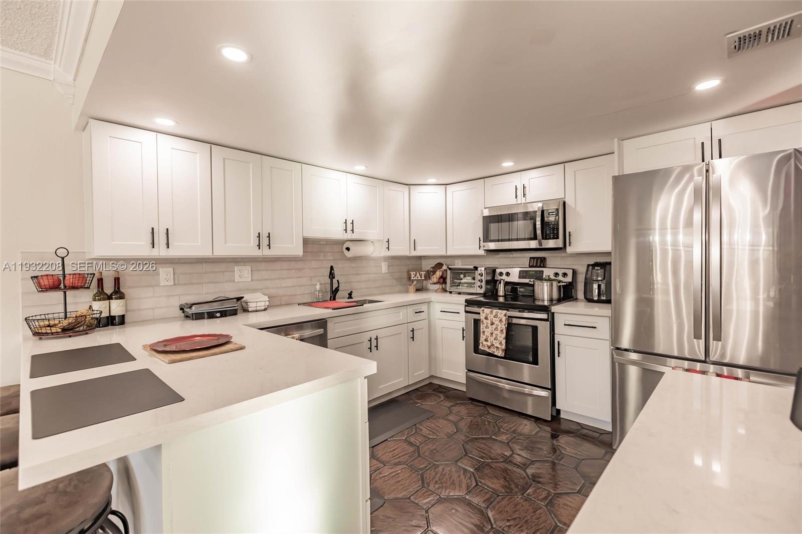 9414-16 SW 8 TERR CONDO - Residential