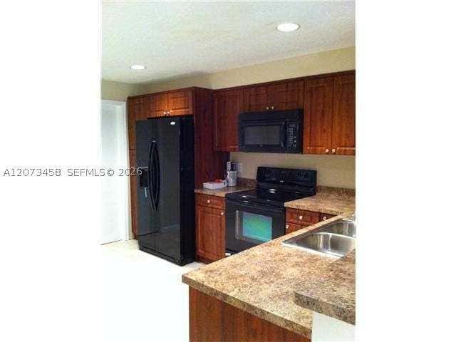 Photo of 1621 Barcelona Way #6-32, Weston, FL 33327 (MLS # A12073458)