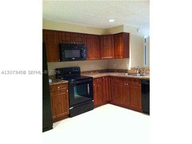 Photo of 1621 Barcelona Way #6-32, Weston, FL 33327 (MLS # A12073458)