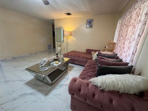 Photo of 5923 Fillmore St, Hollywood, FL 33021 (MLS # A12044121)