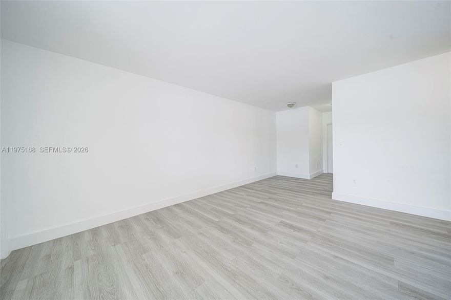 Spacious and bright 2 bedroom, 1 bath residence featuring a functional layout and comfortable living areas. Freshly painted interior and updated flooring create a clean, move-in-ready atmosphere throughout.
Well proportioned bedrooms offer flexibility for living or working from home. Convenient location just minutes from the Design District, Midtown, and Wynwood, with easy access to I-95 and only seven blocks from Biscayne Blvd. Close to shopping, dining, and public transportation.
YouTube video available, search the property address for a full tour.