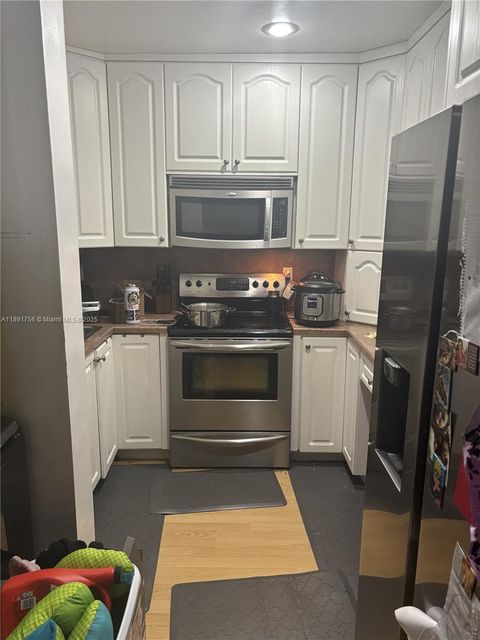 Photo of 11128 Royal Palm Blvd #8-10, Coral Springs, FL 33065 (MLS # A11891756)