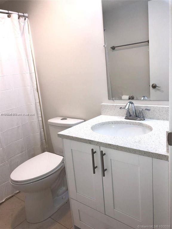 SHERWOOD GARDENS CONDO - Residential Lease