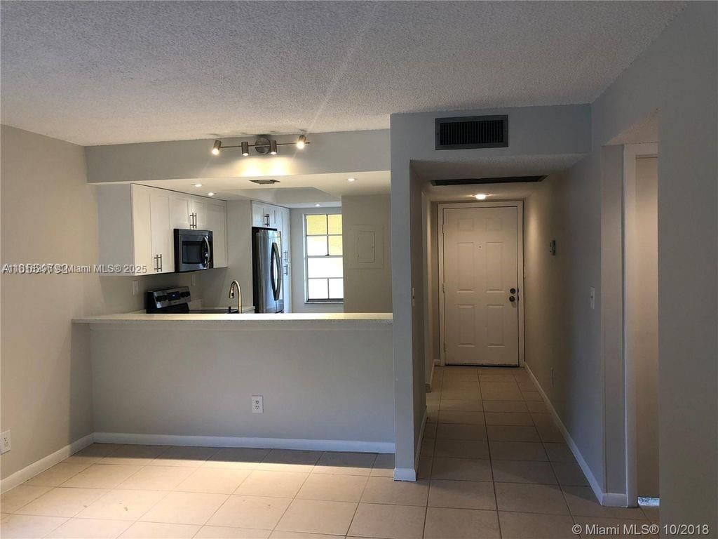Photo of 905 Southridge Rd #104A, Delray Beach, FL 33444 (MLS # A11818296)